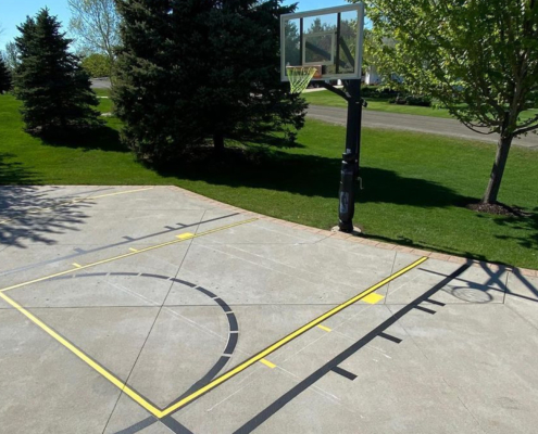 Painted Basketball Court In Driveway