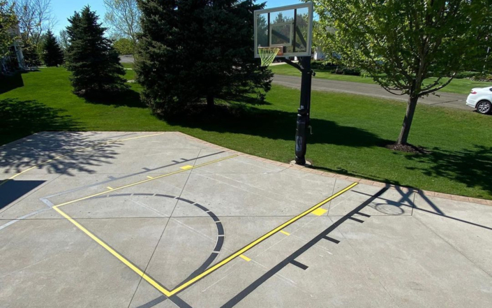 Painted Basketball Court In Driveway