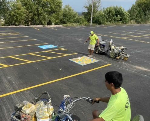 Workers at SSI Painting Lines in Parking Lot