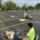Workers at SSI Painting Lines in Parking Lot
