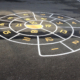 Painted Circular Hopscotch Board On Parking Lot