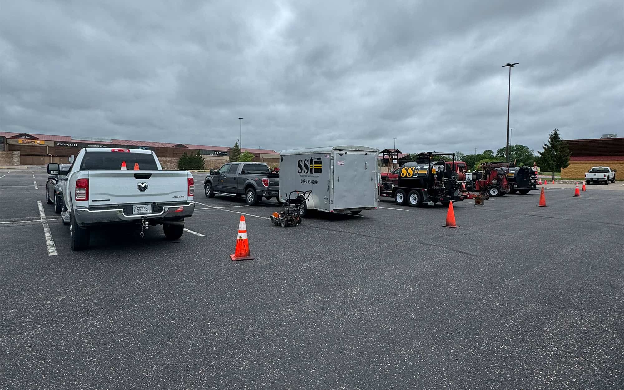 Parking Lot With Seal Coating And Several Ssi Vehicles